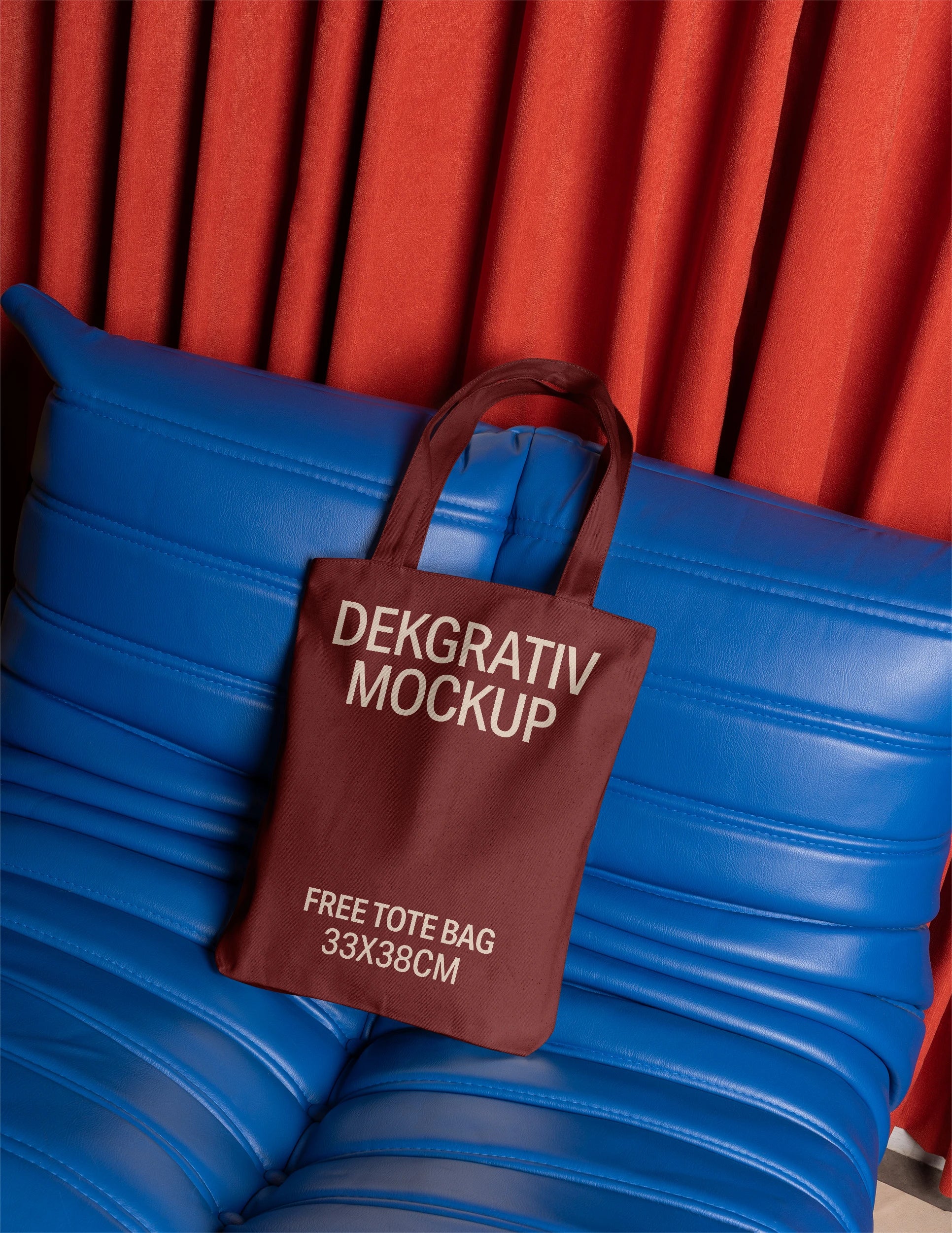 Free Tote Bag on Blue Couch Mockup